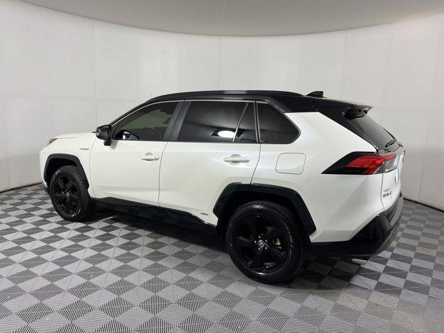 Photo of 2021 Blizzard Pearl/Midnight Black Metallic Toyota RAV4 Hybrid
