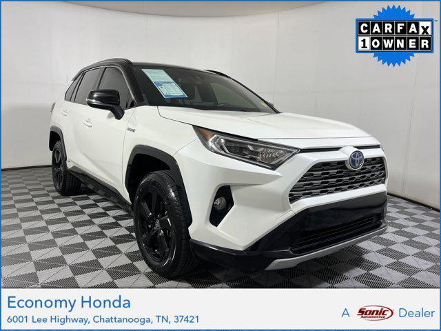 Photo of 2021 Blizzard Pearl/Midnight Black Metallic Toyota RAV4 Hybrid