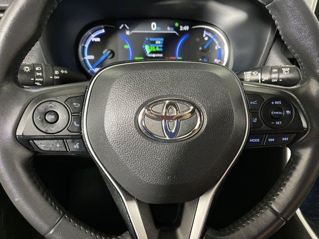 Photo of 2021 Blizzard Pearl/Midnight Black Metallic Toyota RAV4 Hybrid