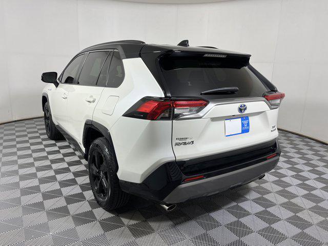 Photo of 2021 Blizzard Pearl/Midnight Black Metallic Toyota RAV4 Hybrid
