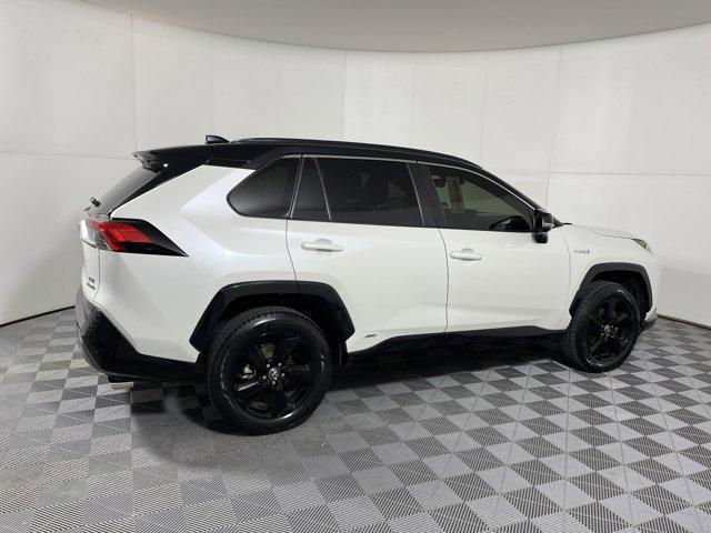 Photo of 2021 Blizzard Pearl/Midnight Black Metallic Toyota RAV4 Hybrid