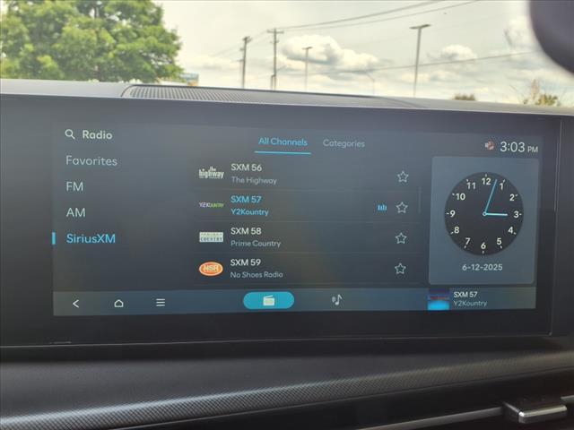 Photo of 2025 Atlantic Blue Hyundai SANTA FE HEV