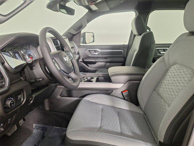 Photo of 2025 Delmonico Red Pearlcoat RAM 1500