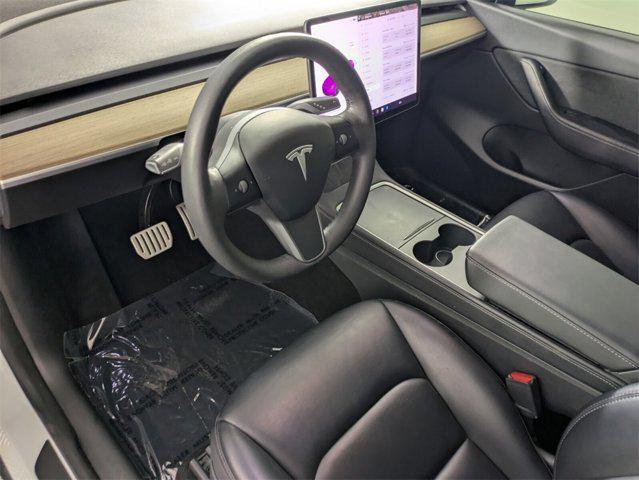 Photo of 2021 Matte Green Tesla Model Y