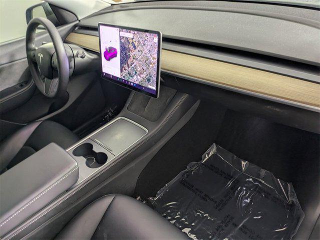 Photo of 2021 Matte Green Tesla Model Y
