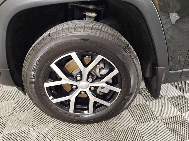Photo of 2024 Rocky Mountain Pearlcoat Jeep Grand Cherokee