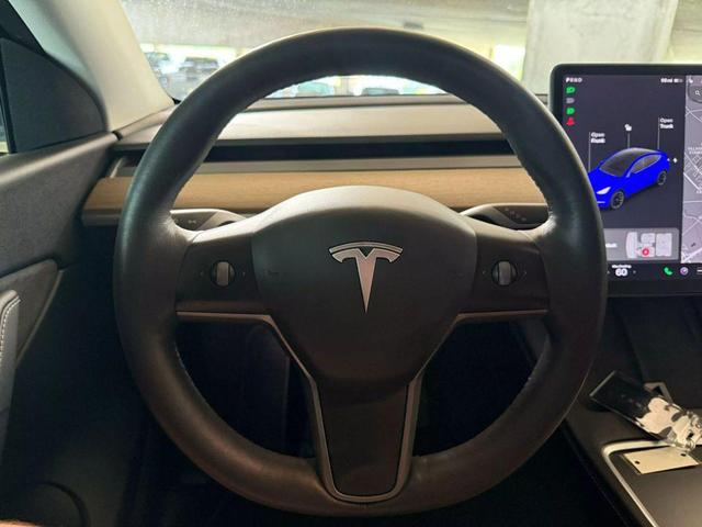 Photo of 2021 Deep Blue Metallic Tesla Model Y