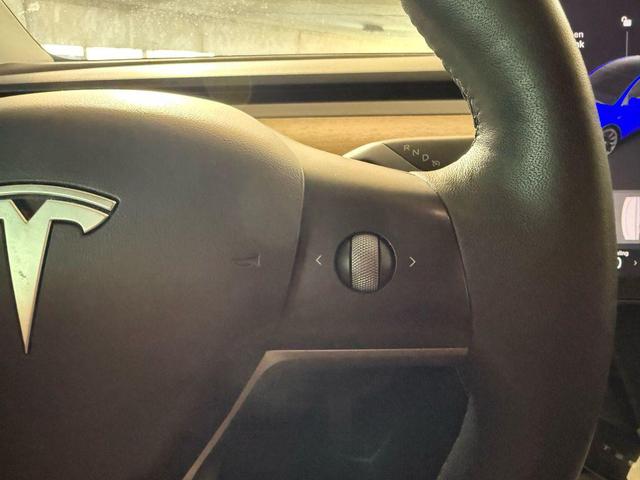 Photo of 2021 Deep Blue Metallic Tesla Model Y