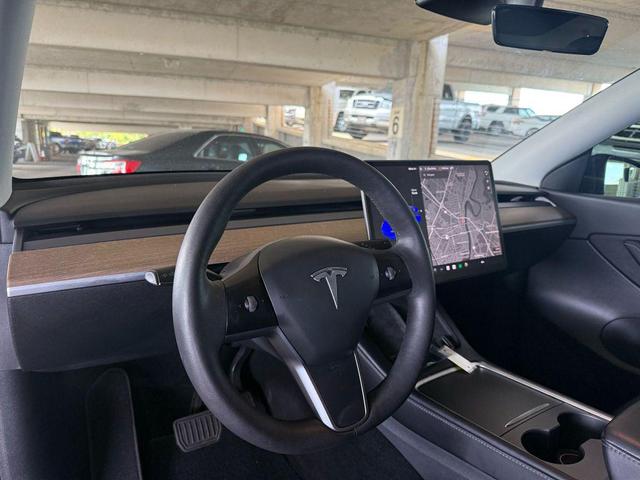 Photo of 2021 Deep Blue Metallic Tesla Model Y