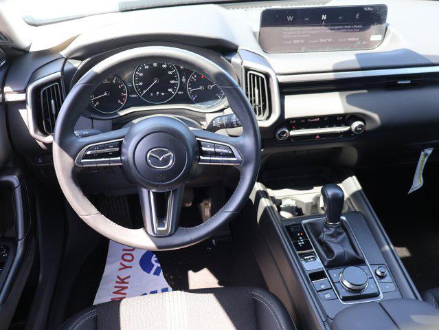 Photo of 2024 Machine Gray Metallic Mazda CX-50