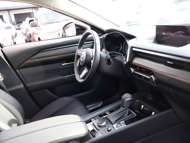 Photo of 2025 Ingot Blue Metallic Mazda CX-50 Hybrid