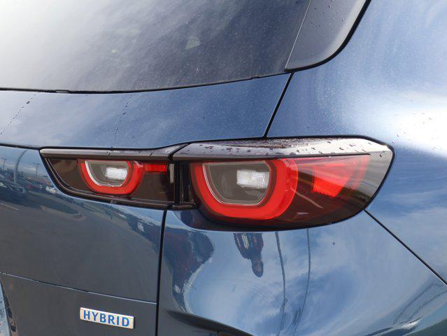 Photo of 2025 Ingot Blue Metallic Mazda CX-50 Hybrid