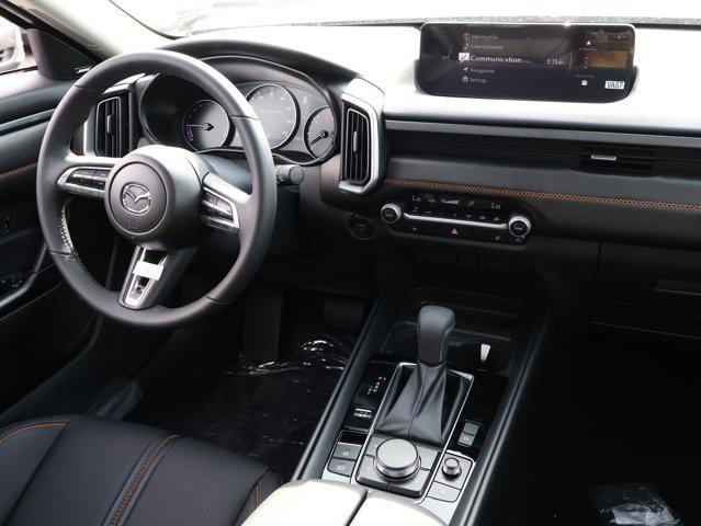 Photo of 2025 Ingot Blue Metallic Mazda CX-50 Hybrid