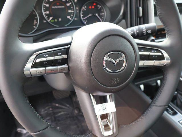 Photo of 2025 Ingot Blue Metallic Mazda CX-50 Hybrid