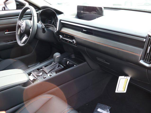 Photo of 2025 Ingot Blue Metallic Mazda CX-50 Hybrid