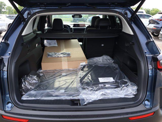 Photo of 2025 Ingot Blue Metallic Mazda CX-50 Hybrid
