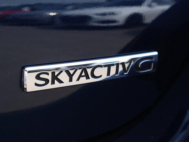 Photo of 2024 Deep Crystal Blue Mica Mazda Mazda3