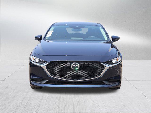 Photo of 2024 Deep Crystal Blue Mica Mazda Mazda3