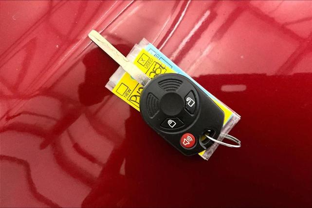 Photo of 2018 Ruby Red Metallic Tinted Clearcoat Ford Escape