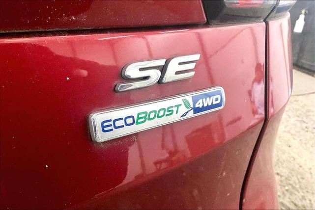 Photo of 2018 Ruby Red Metallic Tinted Clearcoat Ford Escape