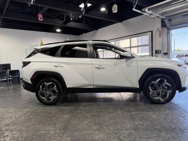Photo of 2023 Serenity White Pearl Hyundai TUCSON Hybrid