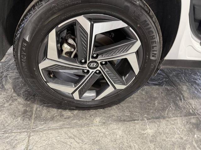 Photo of 2023 Serenity White Pearl Hyundai TUCSON Hybrid