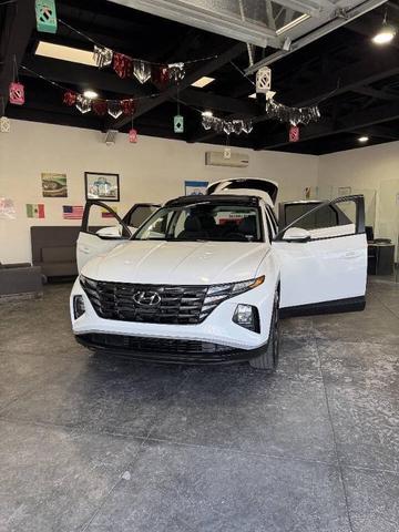 Photo of 2023 Serenity White Pearl Hyundai TUCSON Hybrid