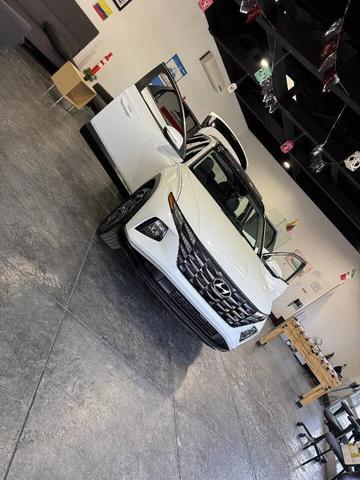 Photo of 2023 Serenity White Pearl Hyundai TUCSON Hybrid