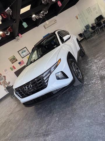 Photo of 2023 Serenity White Pearl Hyundai TUCSON Hybrid