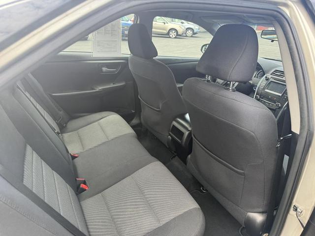 Photo of 2015 Gold Toyota Camry Hybrid