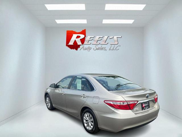 Photo of 2015 Gold Toyota Camry Hybrid