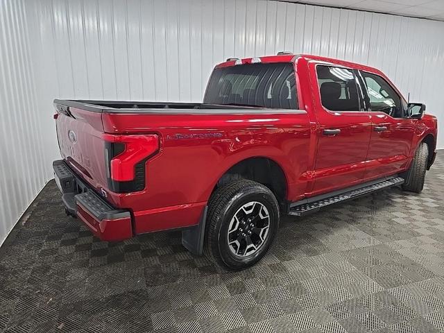 Photo of 2022 Red Metallic Ford F-150 Lightning