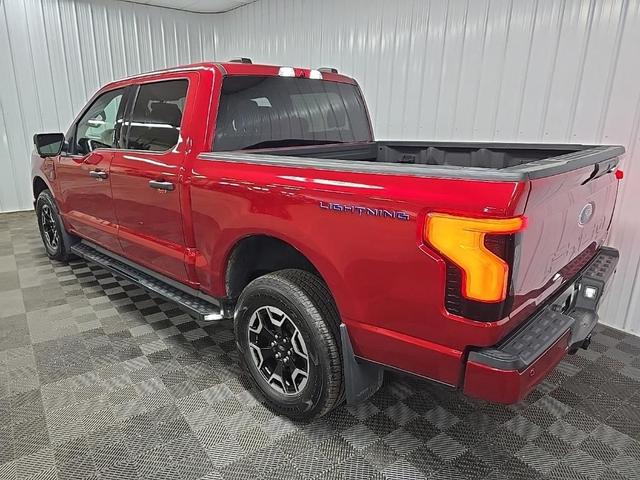 Photo of 2022 Red Metallic Ford F-150 Lightning