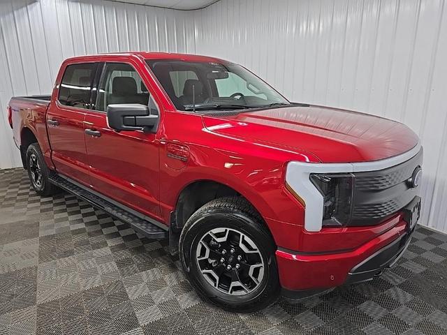 Photo of 2022 Red Metallic Ford F-150 Lightning