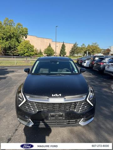 Photo of 2023 Fusion Orange Kia Sportage Hybrid