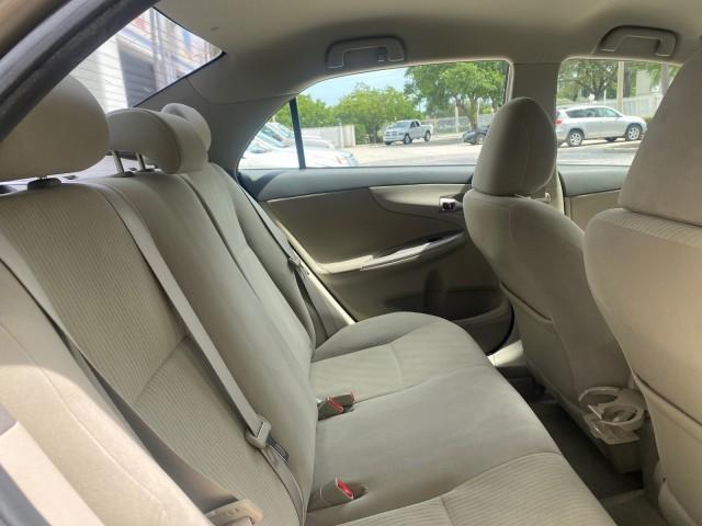 Photo of 2010 Desert Sand Mica Toyota Corolla