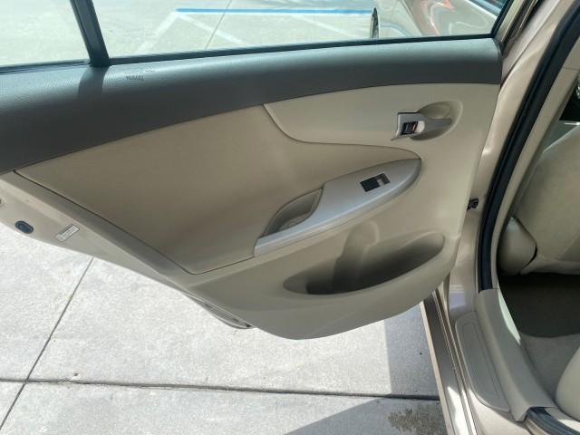 Photo of 2010 Desert Sand Mica Toyota Corolla