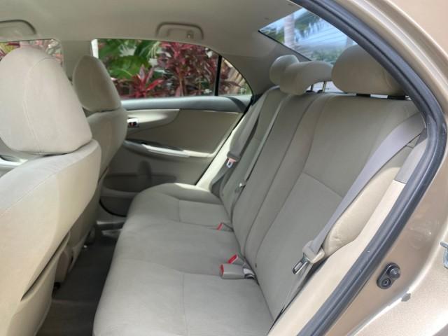 Photo of 2010 Desert Sand Mica Toyota Corolla