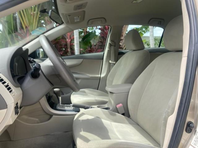 Photo of 2010 Desert Sand Mica Toyota Corolla