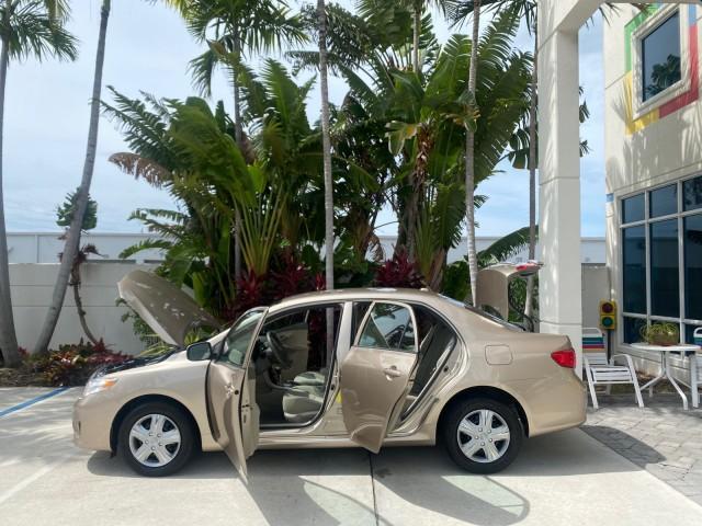 Photo of 2010 Desert Sand Mica Toyota Corolla