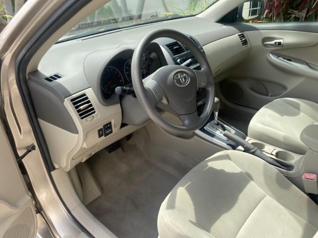 Photo of 2010 Desert Sand Mica Toyota Corolla