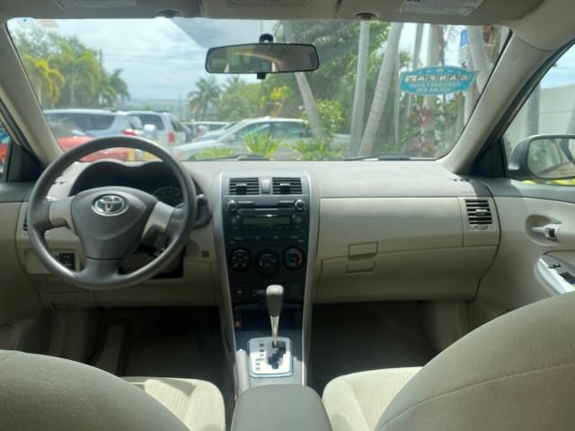 Photo of 2010 Desert Sand Mica Toyota Corolla