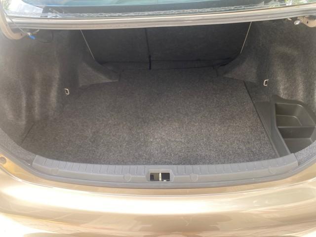 Photo of 2010 Desert Sand Mica Toyota Corolla
