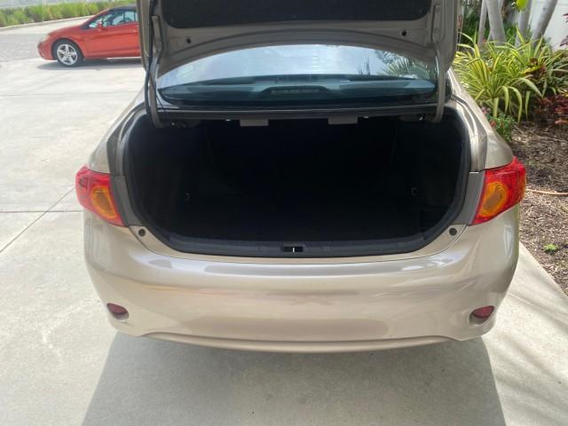 Photo of 2010 Desert Sand Mica Toyota Corolla