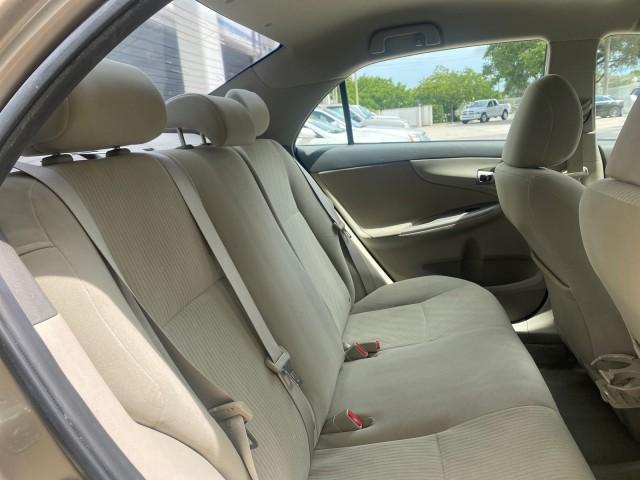 Photo of 2010 Desert Sand Mica Toyota Corolla