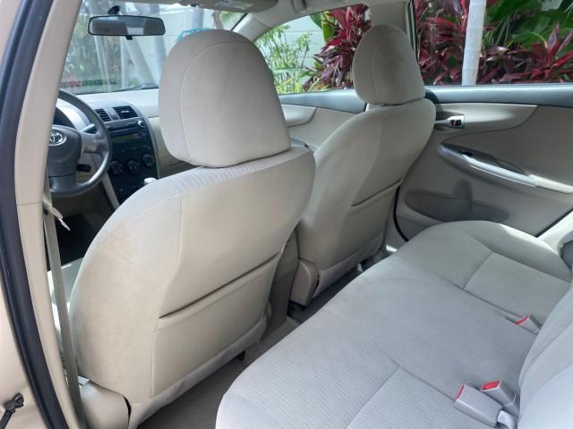 Photo of 2010 Desert Sand Mica Toyota Corolla