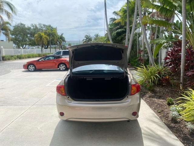 Photo of 2010 Desert Sand Mica Toyota Corolla