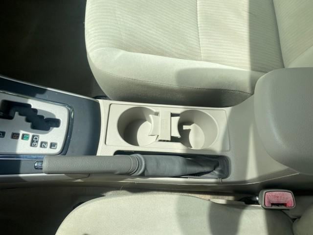 Photo of 2010 Desert Sand Mica Toyota Corolla