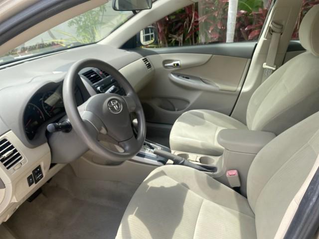 Photo of 2010 Desert Sand Mica Toyota Corolla