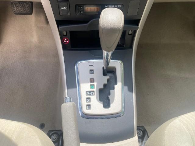 Photo of 2010 Desert Sand Mica Toyota Corolla